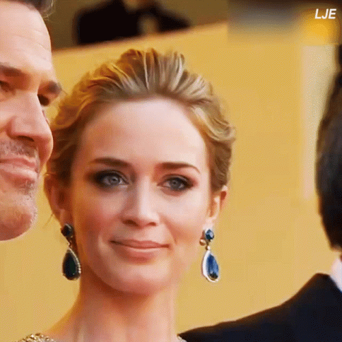 A Close Up Of A Woman 'S Face With The Letters Lje Visible GIF