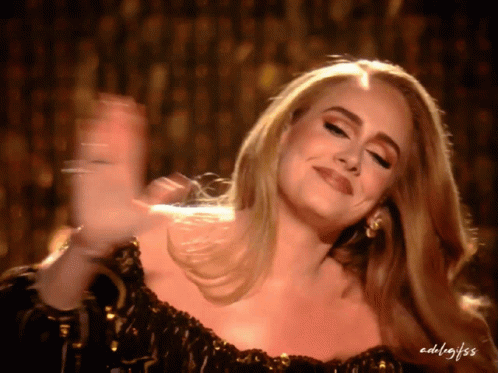 A Close Up Of A Woman 'S Face With The Name Adelajess On The Bottom Right GIF