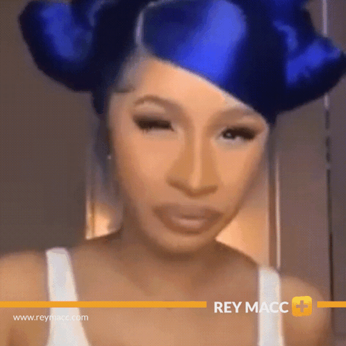 A Close Up Of A Woman 'S Face With The Website Www.reymacc.com In The Upper Right Corner GIF