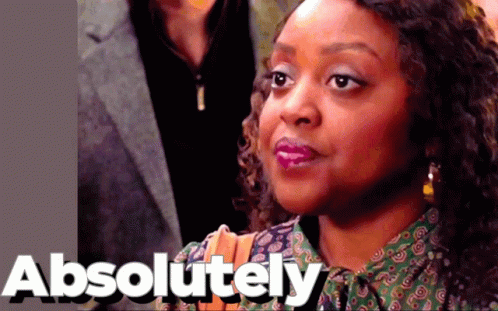 A Close Up Of A Woman 'S Face With The Word Absolutely Behind Her GIF
