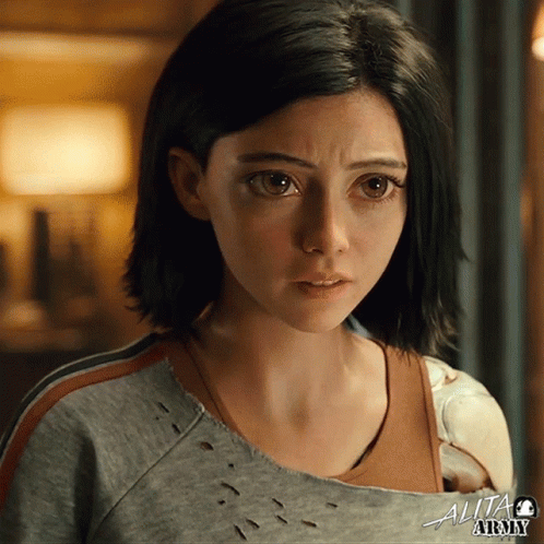 A Close Up Of A Woman 'S Face With The Word Alita Army In The Corner GIF