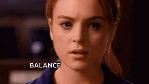 A Close Up Of A Woman 'S Face With The Word Balance Written On It . GIF