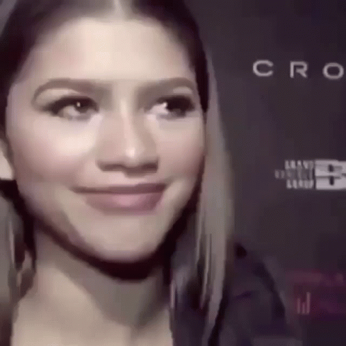 A Close Up Of A Woman 'S Face With The Word Cro In The Corner GIF