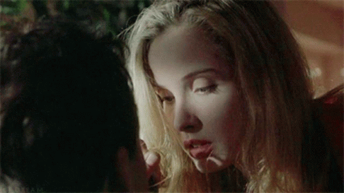 A Close Up Of A Woman 'S Face With The Word Dream On The Bottom Right Corner GIF