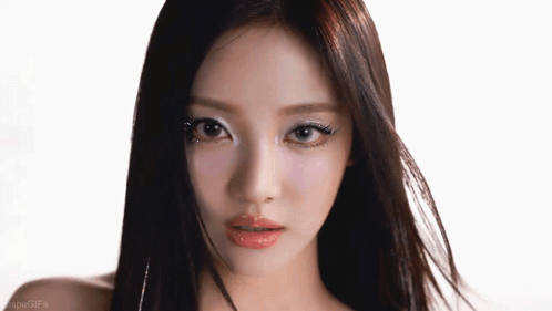 A Close Up Of A Woman 'S Face With The Word Gifs On The Bottom Left GIF