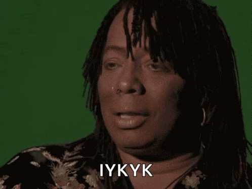 A Close Up Of A Woman 'S Face With The Word Iykyk Written On It GIF