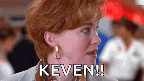 A Close Up Of A Woman 'S Face With The Word Keven Written On It . GIF