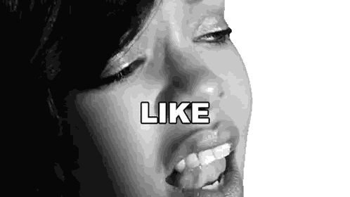 a close up of a woman 's face with the word like above her mouth