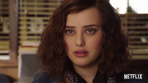 A Close Up Of A Woman 'S Face With The Word Netflix On The Bottom GIF