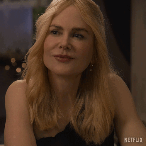 A Close Up Of A Woman 'S Face With The Word Netflix On The Bottom Right GIF
