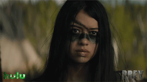 A Close Up Of A Woman 'S Face With The Word Prey In The Corner GIF
