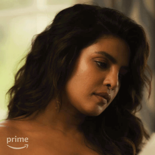 A Close Up Of A Woman 'S Face With The Word Prime On The Bottom GIF