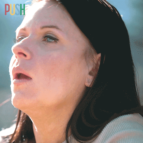 A Close Up Of A Woman 'S Face With The Word Push In The Corner GIF