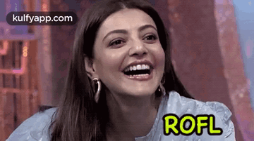 A Close Up Of A Woman 'S Face With The Word Rofl On It . GIF