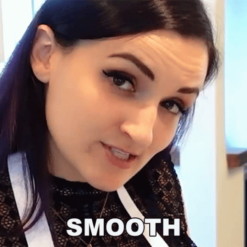 A Close Up Of A Woman 'S Face With The Word Smooth Written Below It GIF