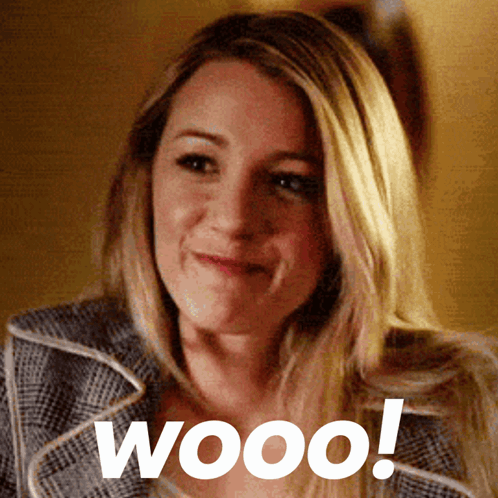 A Close Up Of A Woman 'S Face With The Word Wooo Written On The Bottom GIF