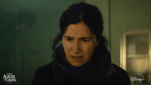 A Close Up Of A Woman 'S Face With The Words Agatha Goes Along On The Bottom GIF