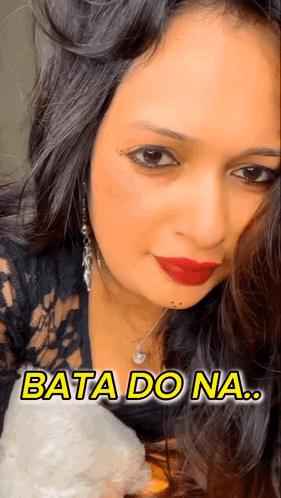 A Close Up Of A Woman 'S Face With The Words Bata Do Na Written Above Her GIF