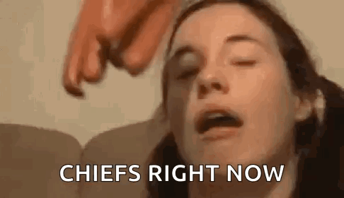 A Close Up Of A Woman 'S Face With The Words `` Chiefs Right Now '' Written Above Her . GIF