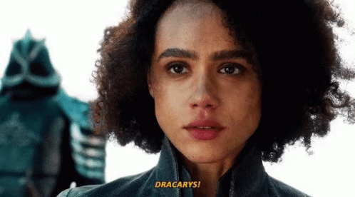 A Close Up Of A Woman 'S Face With The Words " Dracarys " On The Bottom Right GIF