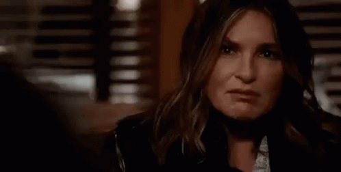 A Close Up Of A Woman 'S Face With The Words `` Fair Enough '' . GIF