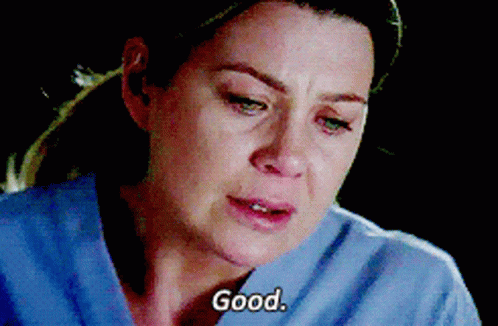 A Close Up Of A Woman 'S Face With The Words " Good " Above Her GIF