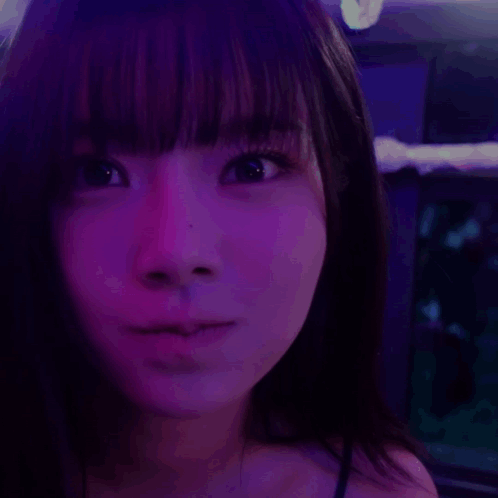 A Close Up Of A Woman 'S Face With The Words Hey Written On It GIF