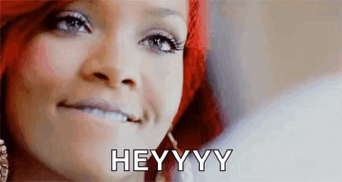 A Close Up Of A Woman 'S Face With The Words `` Hey Yy '' Written On It . GIF