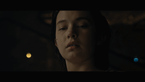 A Close Up Of A Woman 'S Face With The Words " I 'Ll Fix You " Next To Her GIF