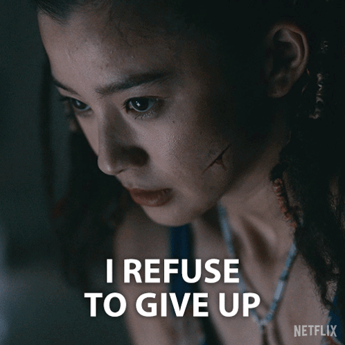 A Close Up Of A Woman 'S Face With The Words I Refuse To Give Up GIF