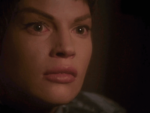 A Close Up Of A Woman 'S Face With The Words I Said Stop Talking Above It GIF