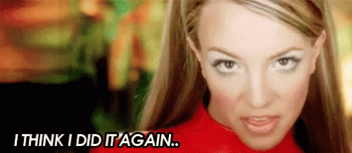 A Close Up Of A Woman 'S Face With The Words `` I Think I Did It Again '' Written Above Her . GIF