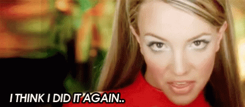 A Close Up Of A Woman 'S Face With The Words `` I Think I Did It Again '' Written Below Her . GIF