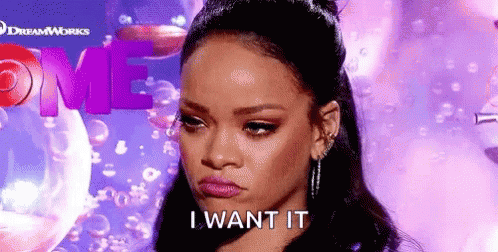 A Close Up Of A Woman 'S Face With The Words `` I Want It '' Written On It . GIF