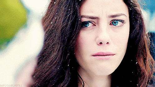 A Close Up Of A Woman 'S Face With The Words Impossiblestill Visible GIF