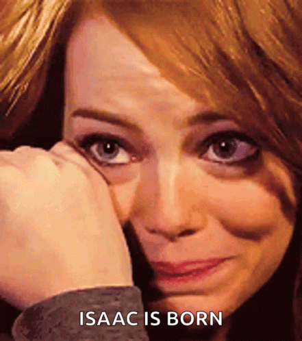 A Close Up Of A Woman 'S Face With The Words Isaac Is Born Below Her GIF