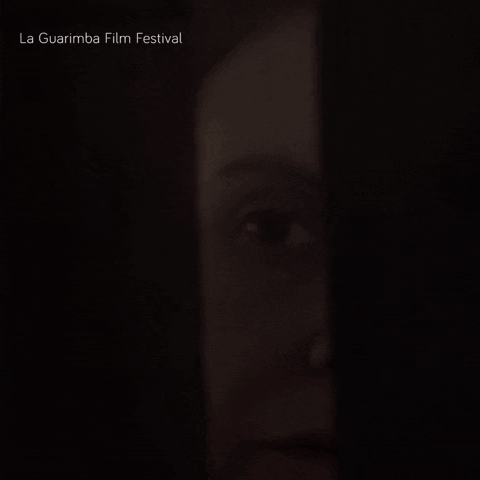 a close up of a woman 's face with the words la guarimba film festival below