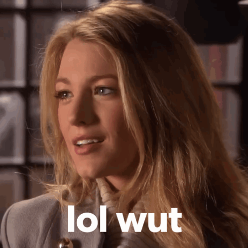 A Close Up Of A Woman 'S Face With The Words Lol Wut Written Below Her GIF