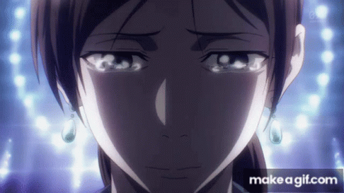 A Close Up Of A Woman 'S Face With The Words Make A Gif.com Below GIF