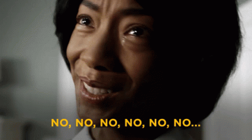 A Close Up Of A Woman 'S Face With The Words " No No No No No No No " Above Her GIF