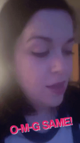 A Close Up Of A Woman 'S Face With The Words O-M-G Same On It GIF