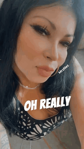 A Close Up Of A Woman 'S Face With The Words Oh Really On It GIF