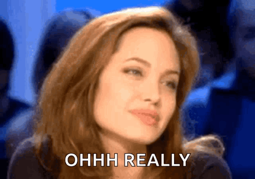 A Close Up Of A Woman 'S Face With The Words Ohhh Really Written On It GIF