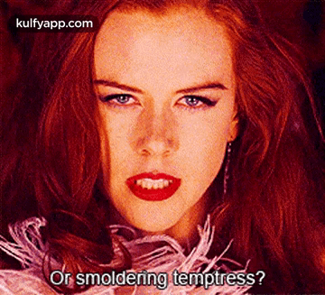 A Close Up Of A Woman 'S Face With The Words " Or Smoldering Temptress ? " GIF