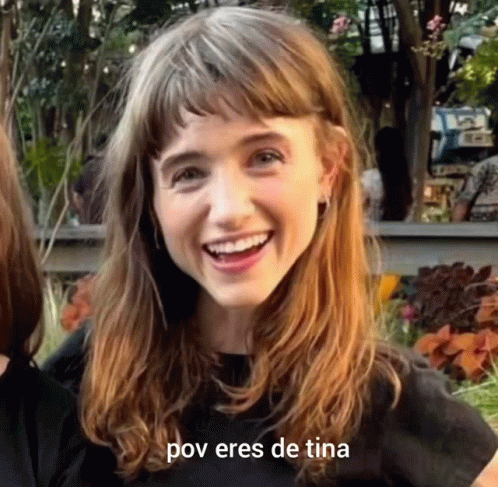 A Close Up Of A Woman 'S Face With The Words Pov Eres De Tina Written Below Her GIF