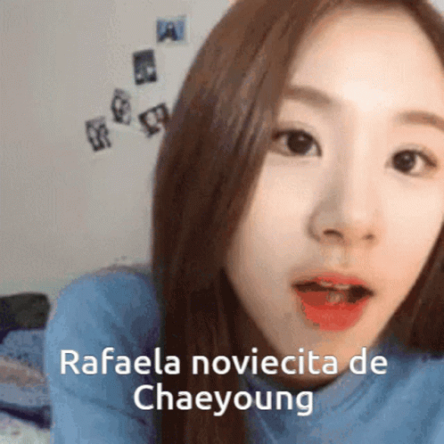 A Close Up Of A Woman 'S Face With The Words " Rafaela Novicita De Chaeyoung " Written On The Bottom GIF