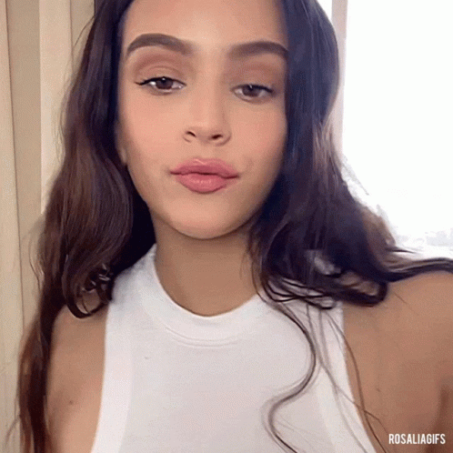 A Close Up Of A Woman 'S Face With The Words Rosaliagifs Above Her GIF