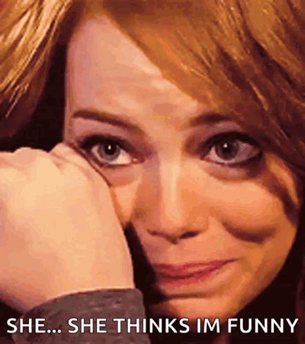 A Close Up Of A Woman 'S Face With The Words She Thinks Im Funny Below Her GIF