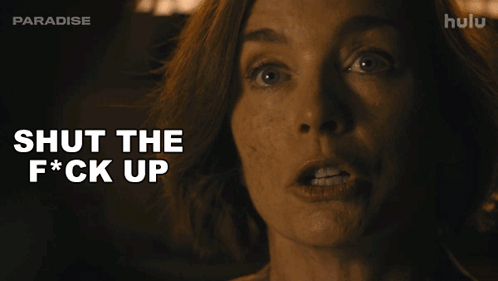 A Close Up Of A Woman 'S Face With The Words Shut The F * Ck Up GIF