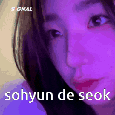 A Close Up Of A Woman 'S Face With The Words Sohyun De Seok Written Below Her GIF